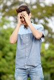 Adolescent masculin triste image libre de droits Adolescent masculin triste image libre de droits