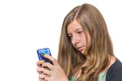 Adolescente biondo che chiama con il telefono cellulare fotografia stock libera da diritti Adolescente biondo che chiama con il telefono cellulare fotografia stock libera da diritti