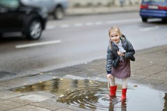 Adorable Girl On A Rainy Day At Autumn Stock Image