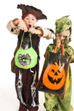 Adorable kids playing trick or treat