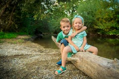 Adorable Siblings Posing For A Portrait Stock Photography