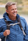 Adult man on a camping holiday looking away smiling, close up, Lake District, UK royalty free stock photos Adult man on a camping holiday looking away smiling, close up, Lake District, UK royalty free stock photos