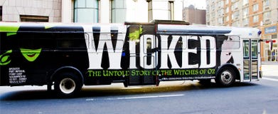 Advertising Wicked. Advertising the musical Wicked on a city bus in NYC Advertising Wicked. Advertising the musical Wicked on a city bus in NYC