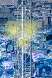 Aerial Antenna telecommunication tower with city behind Stock Image Aerial Antenna telecommunication tower with city behind Stock Image