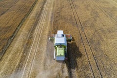 Aerial drone view of harvester combine working on field. Stock Photography Aerial drone view of harvester combine working on field. Stock Photography