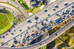 Aerial Drone View Of Road Interchange Or Highway Intersection With Busy Urban Traffic In Modern City During Sunny Day. Traffic Jam Stock Image Aerial Drone View Of Road Interchange Or Highway Intersection With Busy Urban Traffic In Modern City During Sunny Day. Traffic Jam Stock Image