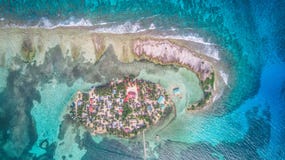 Aerial drone view of Tobacco Caye small Caribbean island in Belize Barrier Reef royalty free stock images Aerial drone view of Tobacco Caye small Caribbean island in Belize Barrier Reef royalty free stock images