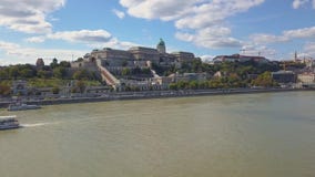 Aerial footage from a drone shows the historical Buda Castle near the Danube on Castle Hill in Budapest, Hungary.