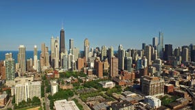 Aerial Illinois Chicago Day. Aerial video of downtown Chicago during the day in Illinois Aerial Illinois Chicago Day. Aerial video of downtown Chicago during the day in Illinois