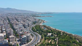 Aerial panoramic view of Athens, charming Aegean Sea and cityscape