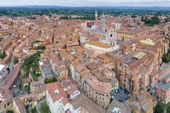 Aerial panoramic view of Siena Cathedral, Duomo di Siena, and Old Town of medieval city of Siena, Tuscany, Italy stock photography Aerial panoramic view of Siena Cathedral, Duomo di Siena, and Old Town of medieval city of Siena, Tuscany, Italy stock photography