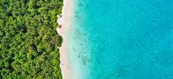 Aerial photo of tropical Maldives beach on island stock image Aerial photo of tropical Maldives beach on island stock image