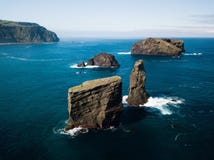 Aerial picture of wild rock formations in the middle of the open atlantic ocean next to Mosteiros, in Sao Miguel island, Azores, P