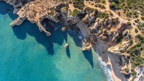 Aerial. Rocky shore formation and beaches of Portimao. View from sky. Stock Image Aerial. Rocky shore formation and beaches of Portimao. View from sky. Stock Image
