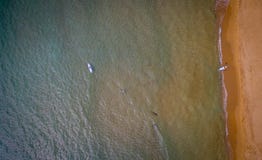 Aerial shot of beautiful blue clear waters and people enjoying water activities in Corfu Greece. Royalty Free Stock Photo Aerial shot of beautiful blue clear waters and people enjoying water activities in Corfu Greece. Royalty Free Stock Photo