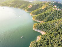 Aerial Trees And Cliff Rock Wall Crystal Water At Lake Travis, A Royalty Free Stock Images
