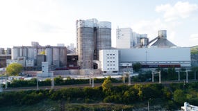 Aerial view of cement manufacturing plant. Concept of buildings at the factory, steel pipes, giants. royalty free stock photography Aerial view of cement manufacturing plant. Concept of buildings at the factory, steel pipes, giants. royalty free stock photography