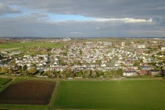 Aerial view of a city and farm fields Stock Photos Aerial view of a city and farm fields Stock Photos
