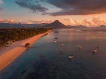 Aerial view of Flic and Flac, Mauritius in sunset light. Exotic beach sunset stock image Aerial view of Flic and Flac, Mauritius in sunset light. Exotic beach sunset stock image