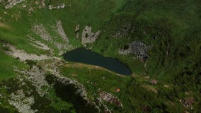 Aerial View of the highest lake of Carpathian Mountains - Brebenescul