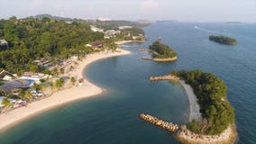 Aerial view of lagoon with blue, azure water in the middle of small islands and rocks. Shot. Beach, tropical island, sea royalty free stock photo Aerial view of lagoon with blue, azure water in the middle of small islands and rocks. Shot. Beach, tropical island, sea royalty free stock photo