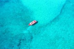 Aerial view of a moored motorboat on Mykonos island, Greece Stock Image Aerial view of a moored motorboat on Mykonos island, Greece Stock Image