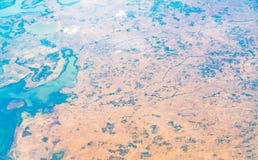 Aerial view over Earth Sea and Coast ,View from the airplane . Stock Photos Aerial view over Earth Sea and Coast ,View from the airplane . Stock Photos