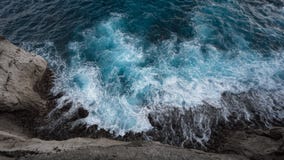 Aerial view to ocean waves and rock coast. Aerial view to ocean waves and coast Royalty Free Stock Photos Aerial view to ocean waves and rock coast. Aerial view to ocean waves and coast Royalty Free Stock Photos