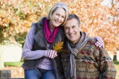 Affectionate senior couple on autumn walk Stock Image Affectionate senior couple on autumn walk Stock Image