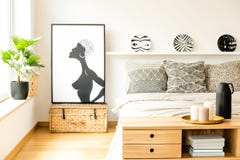 Affisch i hemtrevlig sovruminre arkivfoto Affisch i hemtrevlig sovruminre arkivfoto