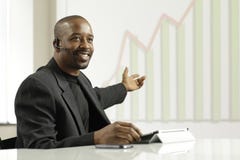 African American Business Man Presenting Profits Royalty Free Stock Photo African American Business Man Presenting Profits Royalty Free Stock Photo