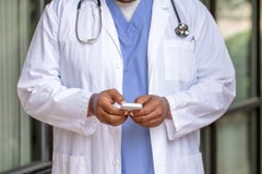 African American Doctor Texting royalty free stock image African American Doctor Texting royalty free stock image