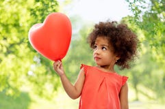 African american girl with heart shaped balloon stock photos African american girl with heart shaped balloon stock photos