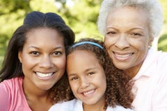 African American Grandmother, Mother And Daughter Relaxing In Pa royalty free stock photography African American Grandmother, Mother And Daughter Relaxing In Pa royalty free stock photography