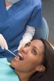African-American woman and Caucasian dentist