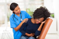 Medical worker comforting patient stock image Medical worker comforting patient stock image