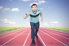 African man jogging on the running track Stock Photography African man jogging on the running track Stock Photography