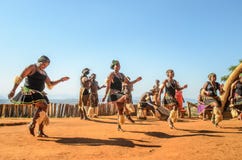 African zulu people dancing and jumping in traditional clothes, gear. Lifestyle South Africa