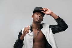 Afroamerican cheeky and pert gang member guy Royalty Free Stock Image Afroamerican cheeky and pert gang member guy Royalty Free Stock Image
