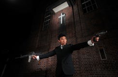 Agent/ Killer Pointing Guns Towards Target Stock Image Agent/ Killer Pointing Guns Towards Target Stock Image
