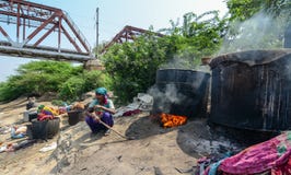 People dye traditional clothes on riverbank stock image People dye traditional clothes on riverbank stock image