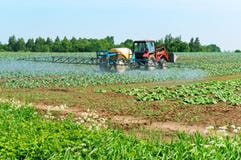 Agricultural machine sprayer, processing of fields of chemicals, protecting fields against pests stock image Agricultural machine sprayer, processing of fields of chemicals, protecting fields against pests stock image