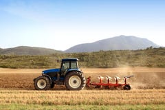 Agriculture Plowing Tractor On Wheat Cereal Fields Royalty Free Stock Photos Agriculture Plowing Tractor On Wheat Cereal Fields Royalty Free Stock Photos