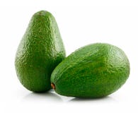 Aguacate maduro verde dos aislado en blanco Imagen de archivo libre de regalías Aguacate maduro verde dos aislado en blanco Imagen de archivo libre de regalías