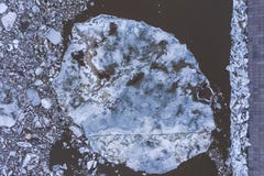 Aierial view from the top down on ice floes floating on the river. royalty free stock photography Aierial view from the top down on ice floes floating on the river. royalty free stock photography