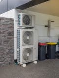 Air conditioning and heating units for a residential house stock photos Air conditioning and heating units for a residential house stock photos