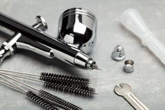 Airbrush Cleaning. Brushes And Other Airbrush Cleaning Tools Stock Photos
