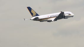 Airbus A380 of Singapore airlines after takeoff stock video Airbus A380 of Singapore airlines after takeoff stock video