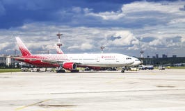 Aircraft of Rossiya Airlines on the airfield of Vnukovo Airport, Moscow, Stock Photography Aircraft of Rossiya Airlines on the airfield of Vnukovo Airport, Moscow, Stock Photography