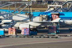 Aircraft unloading cargo